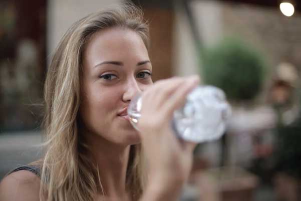 Woman Drinking Bottled Water