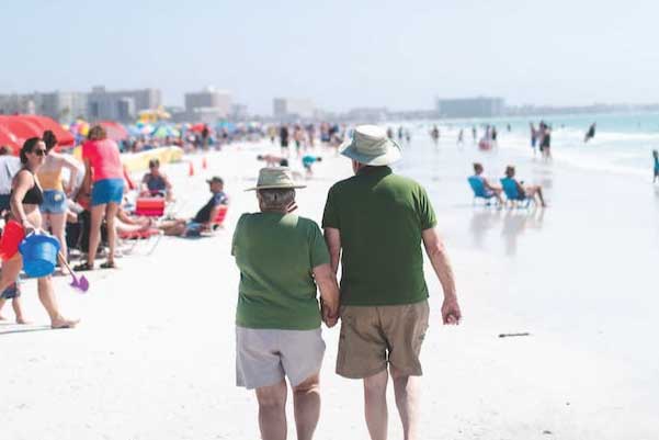 Senior Couple on busy beach