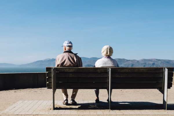 Seniors Sitting on Bench