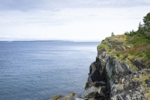 Cliff by water