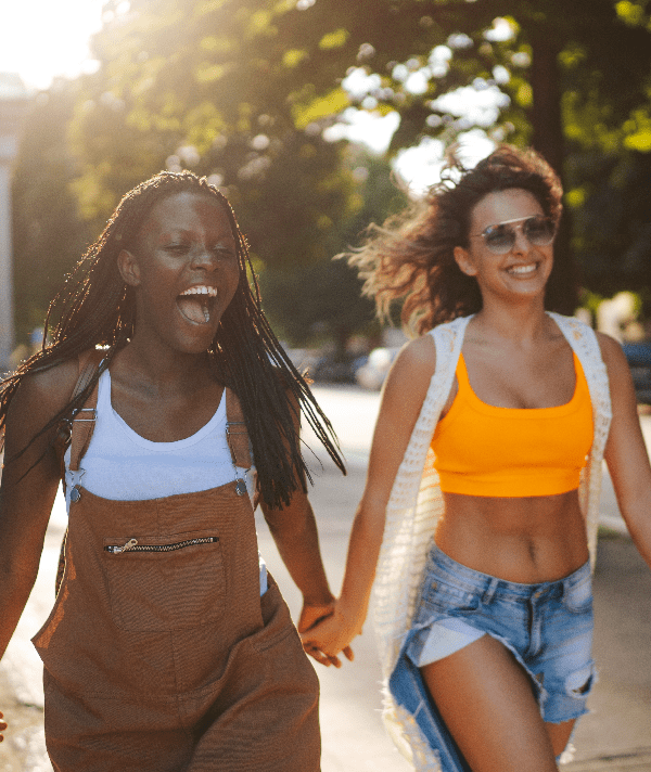 lesbians CAP two women holding hands down the street