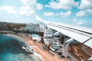 Airplane over beach