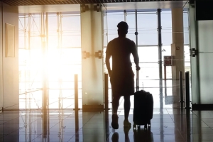 Man at airport with luggage